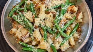 Potatoes and green beans in skillet ready to serve