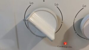 preheating burner on low heat for pan frying cuban stuffed pork chops recipe