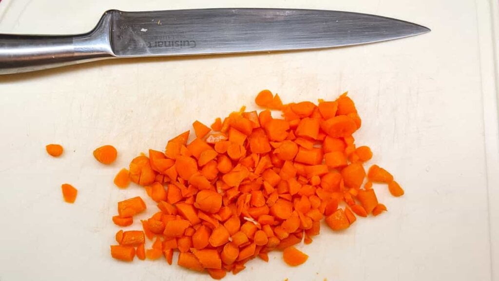 prep step dice carrots for asian chicken rice casserole