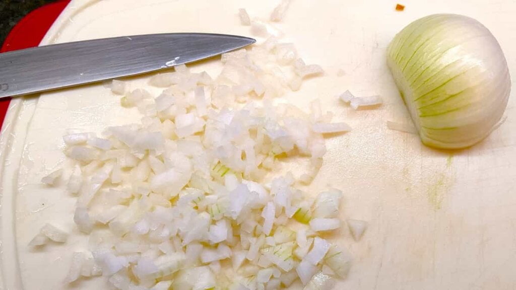 prep step dice onions for asian chicken rice casserole