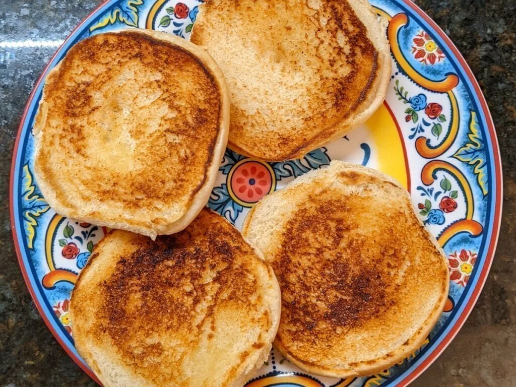 Prepare the buns for pulled pork sandwich how to make a pulled pork sandwich starting with grilled bun