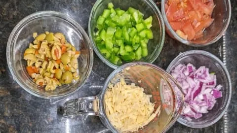 prepared veggie toppings for homemade pizzas oven baked