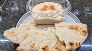ready to serve naan bread and hummus with tahini