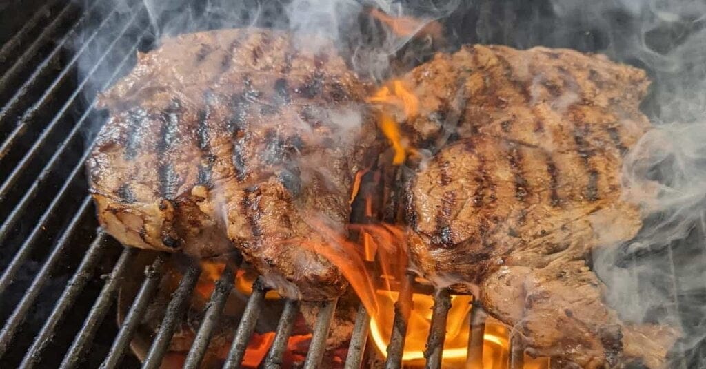 ribeye steak on grill