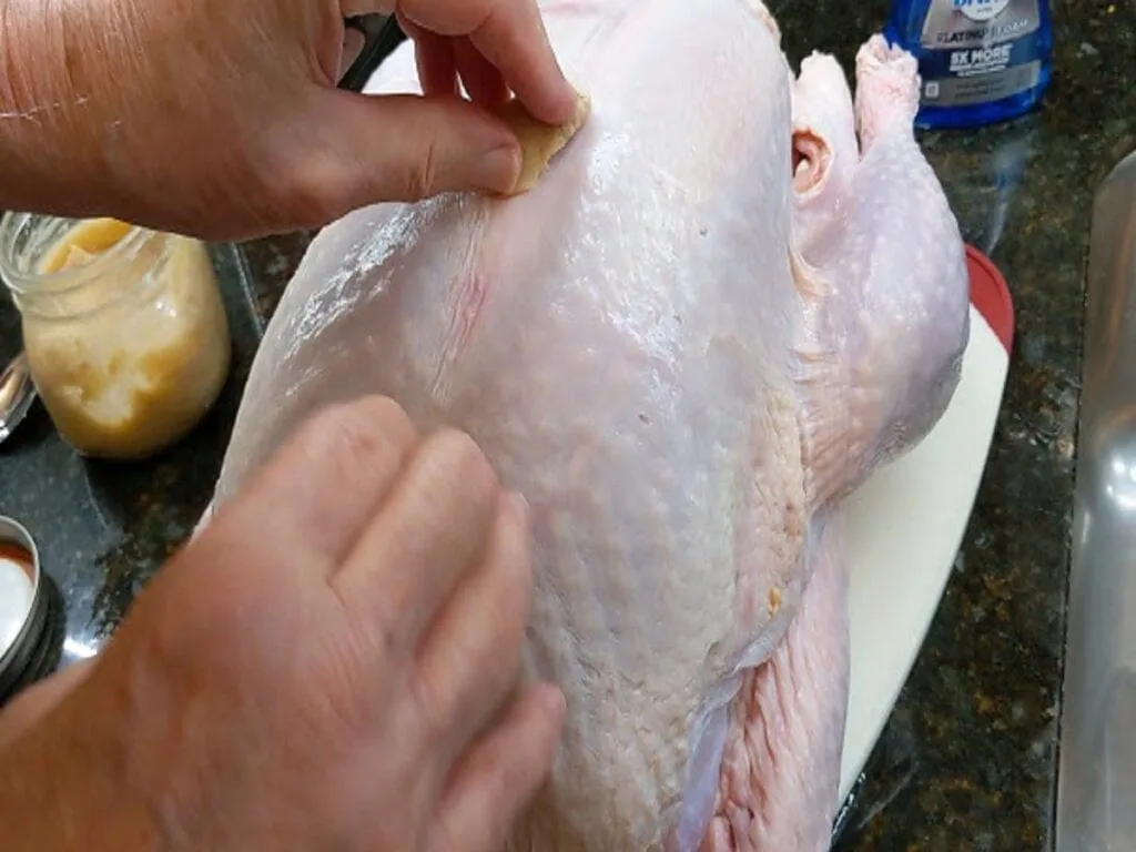 rub oil or bacon drippings on skin
