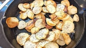 seasoning and 2nd turn potatoes in recipe for pan fried potato slices