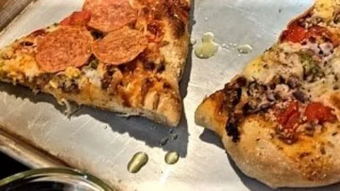serving leftover homemade oven baked pizzas