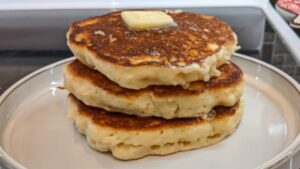 stacking fluffy buttermilk pancakes from old fashioned pancakes recipe