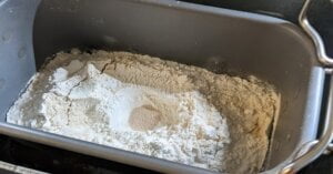 step of french bread ingredients added to bread maker