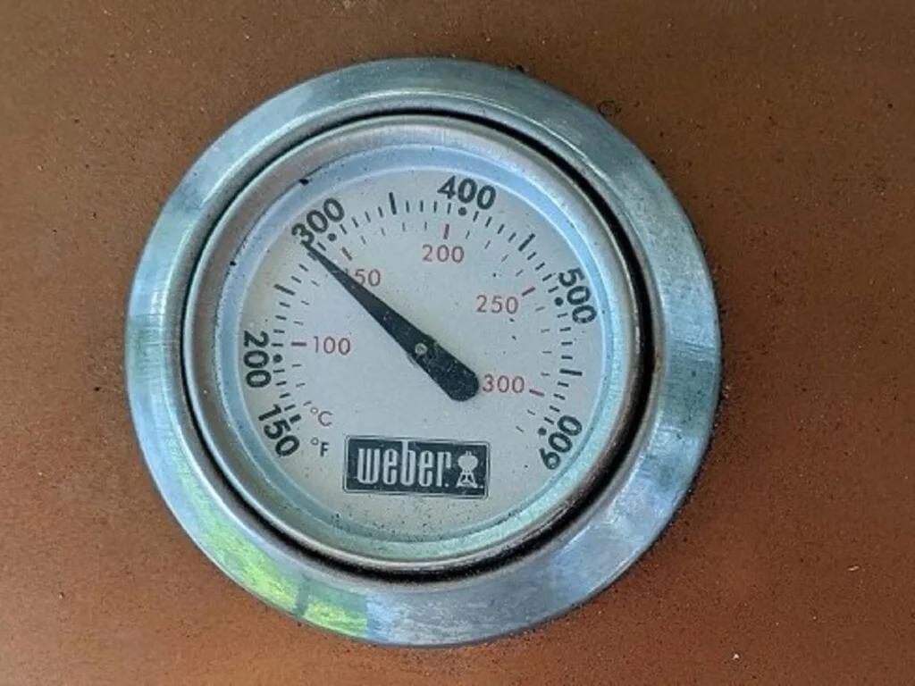temp drops after adding charcoal to pork tenderloin on grill