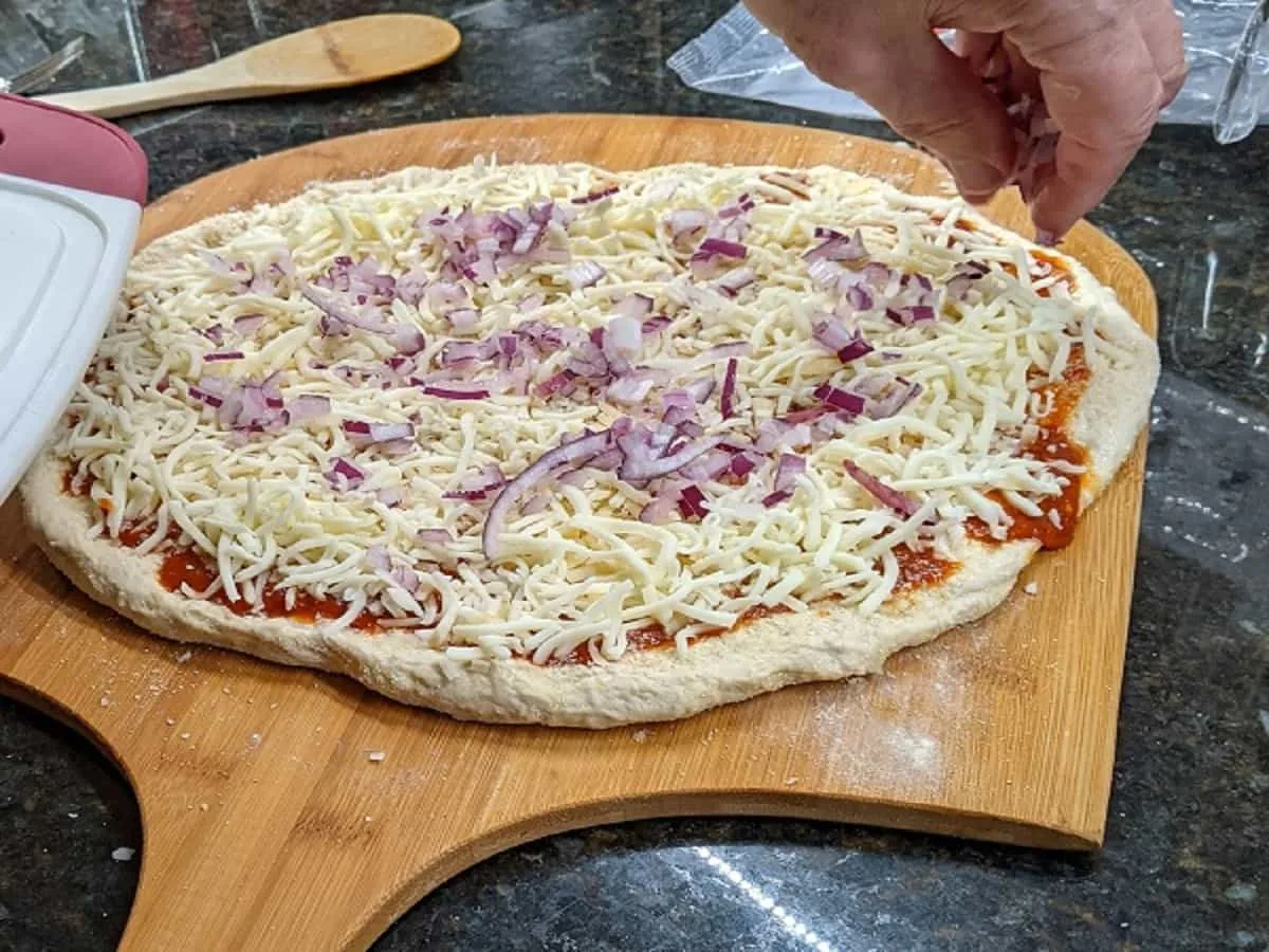 topping the pizza directly on the pizza peel