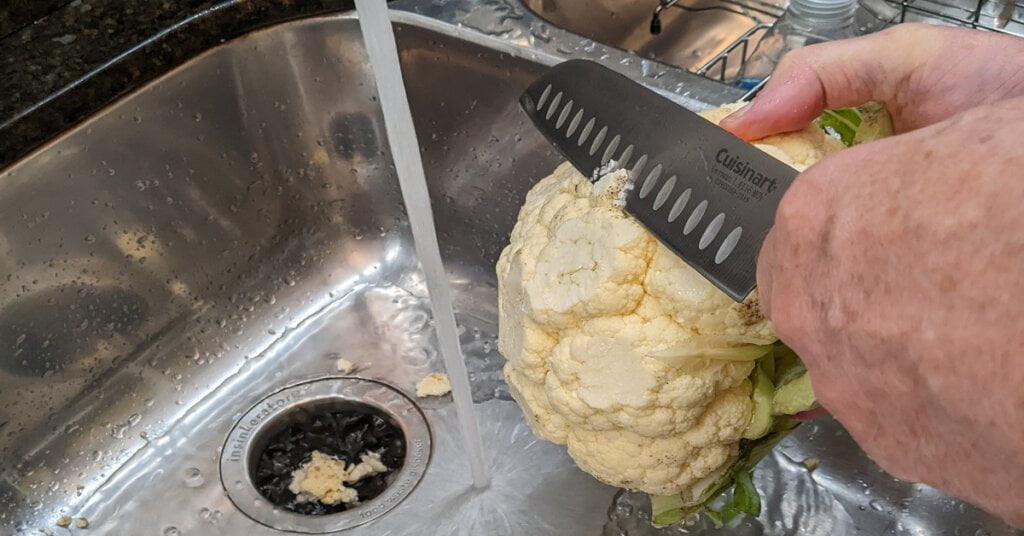 how to cut cauliflower into florets by starting to prep it