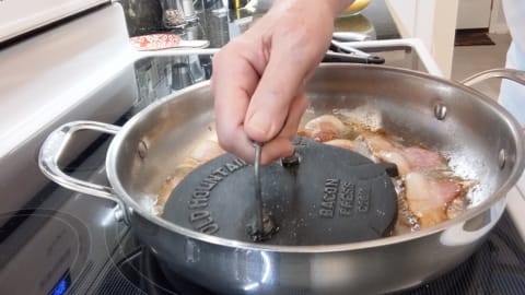 use press and hold down to keep bacon from curling use press and hold down to keep bacon from curling