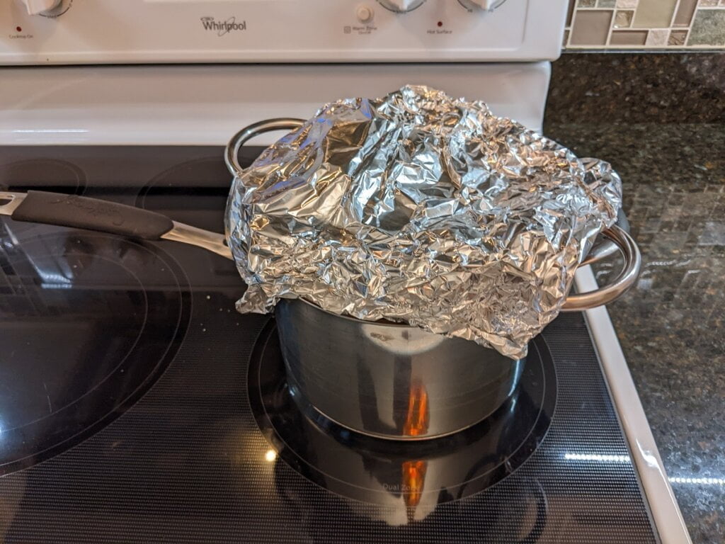 warming up dinner rolls in pot