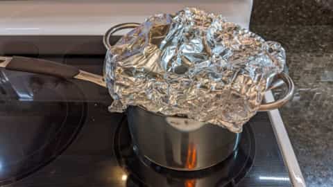 warming up dinner rolls in pot