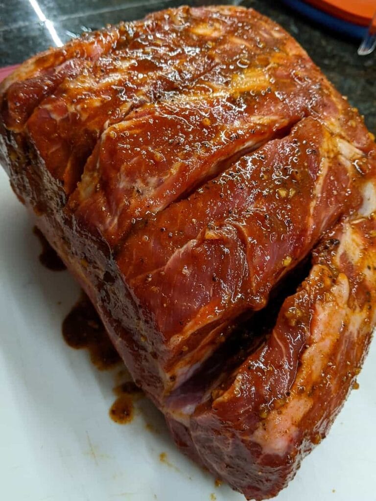 wet rub applied over the pulled pork