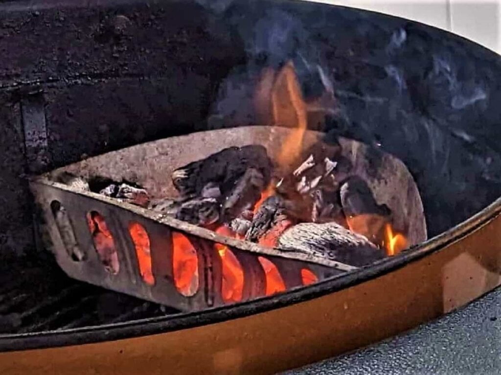 When charcoal is ready and hot for grilling on charcoal