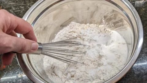whisking together ingredients of dry pancake mix recipe whisking together ingredients of dry pancake mix recipe
