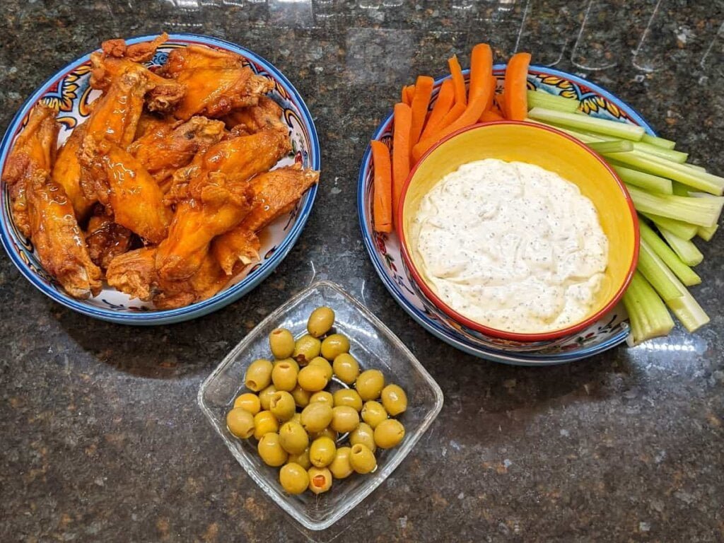 Wings veggies and dip for good super bowl food ideas